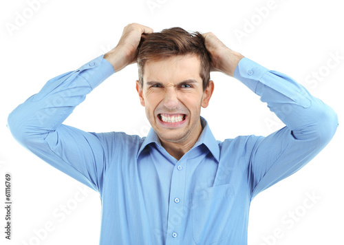 Angry young man isolated on...