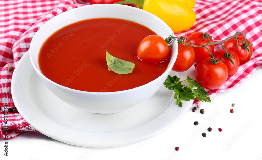 Tasty tomato soup and vegetables, isolated on white Tasty tomato soup and vegetables, isolated on white