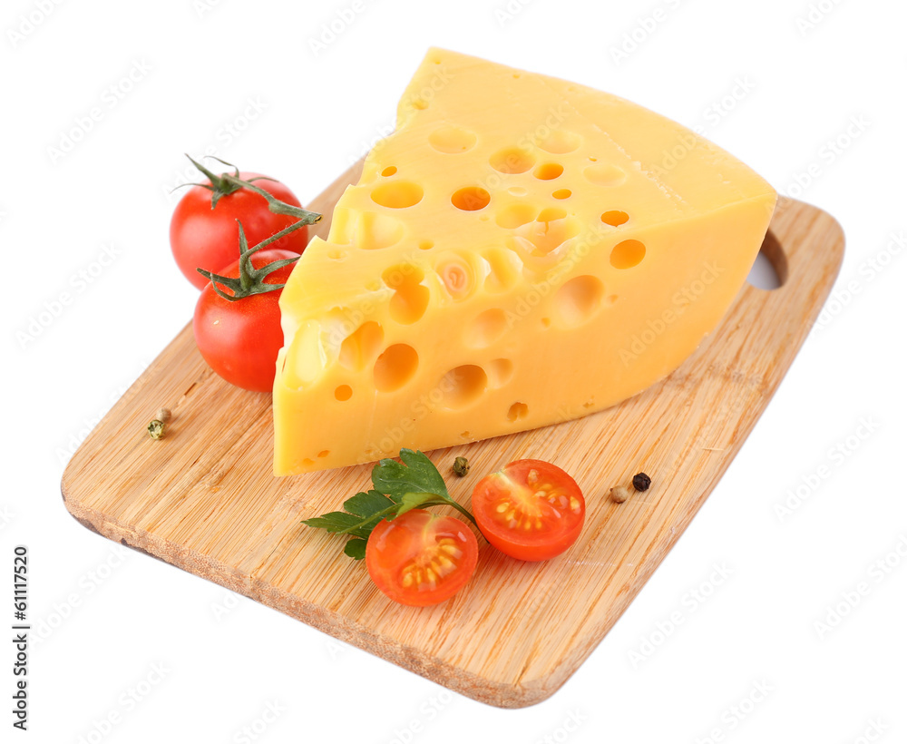 Piece of cheese and tomatoes, on wooden board, isolated on Piece of cheese and tomatoes, on wooden board, isolated on