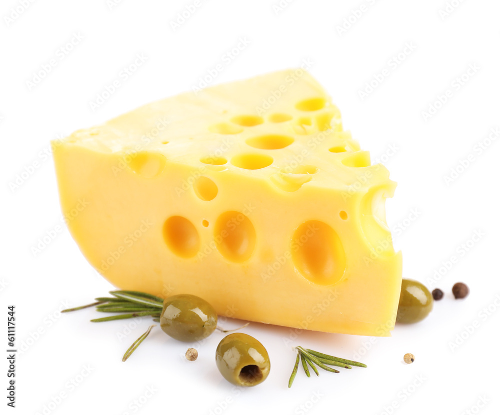 Piece of cheese with green olives, isolated on white