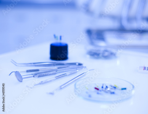 Dentist equipment on blue background