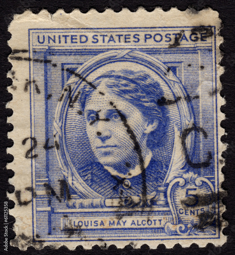 Postage stamp ca. 1940 showing female writer Louisa May Alcott photo