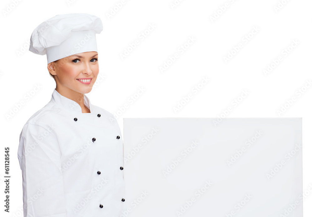 smiling female chef with white blank board smiling female chef with white blank board