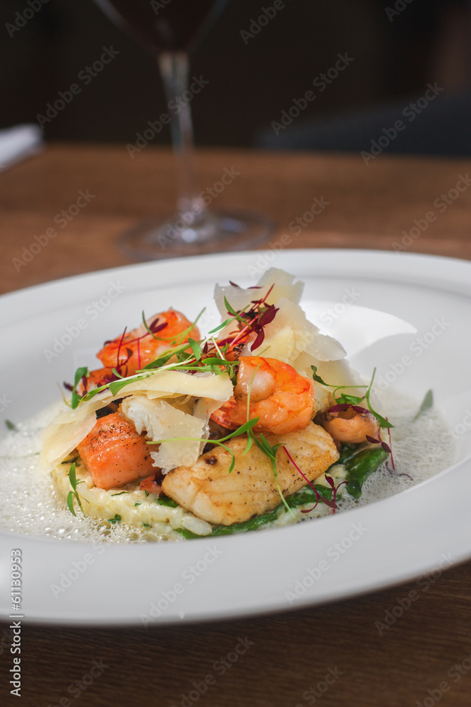 Image of tasty salad with shrimps and cheese in restaurant Image of tasty salad with shrimps and cheese in restaurant