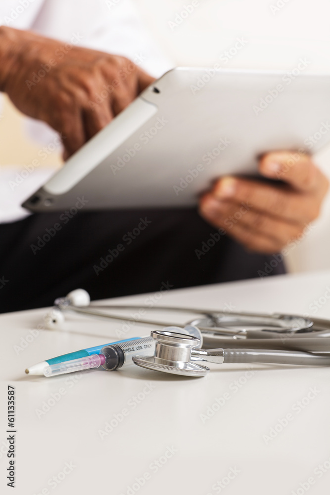 Fototapeta premium Doctor using a digital tablet