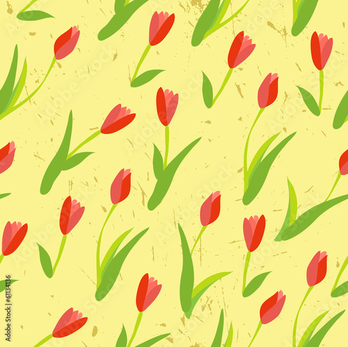 Seamless background with colored tulips.