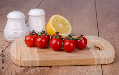 Cherry tomatoes on a cutting board