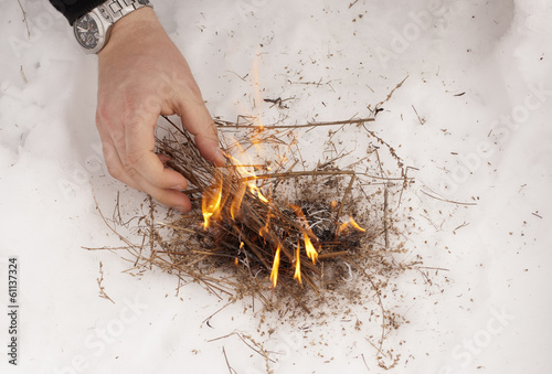 Lighting a fire photo