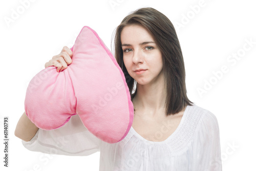 Girl with valentine pink pillow heart