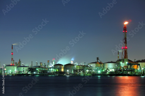 Industrial building and seascape at night