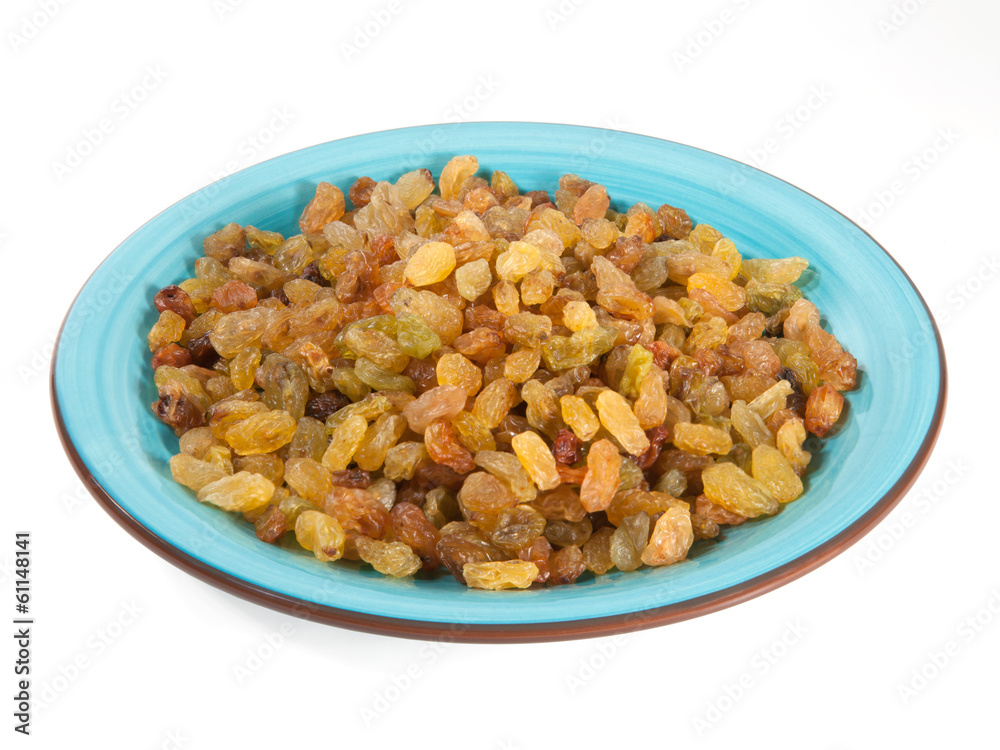 Raisins in a bowl isolated on white background Raisins in a bowl isolated on white background