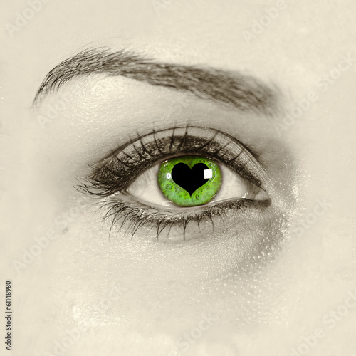 Green eye with heart shape in it