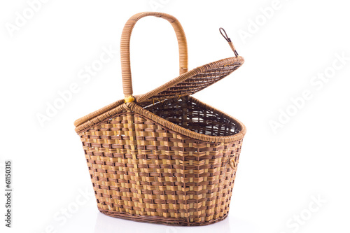 Lid-opened wicker basket isolated