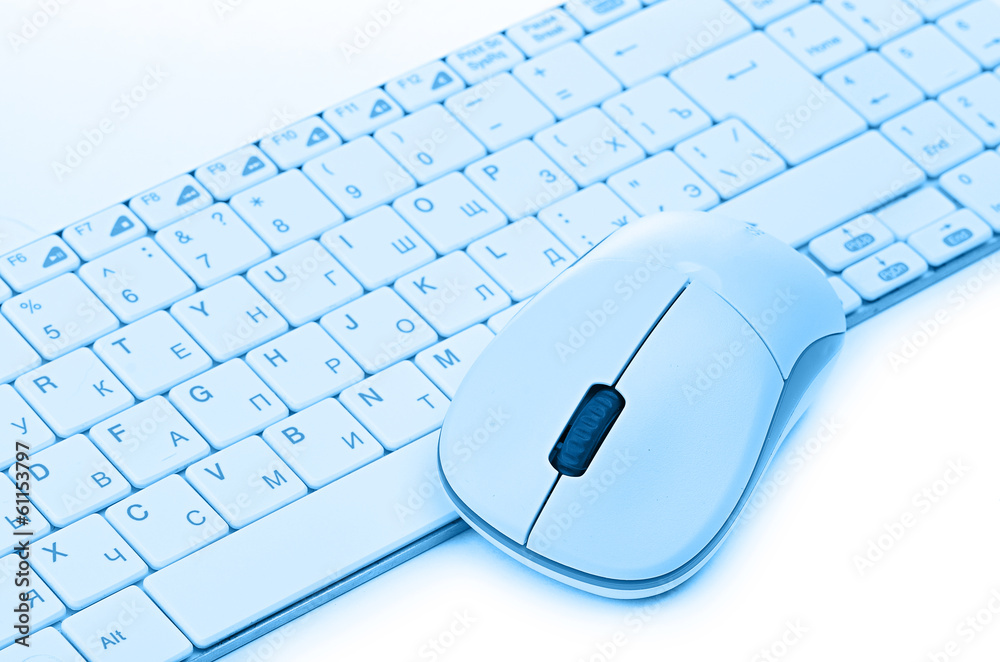 Fototapeta computer mouse on the keyboard
