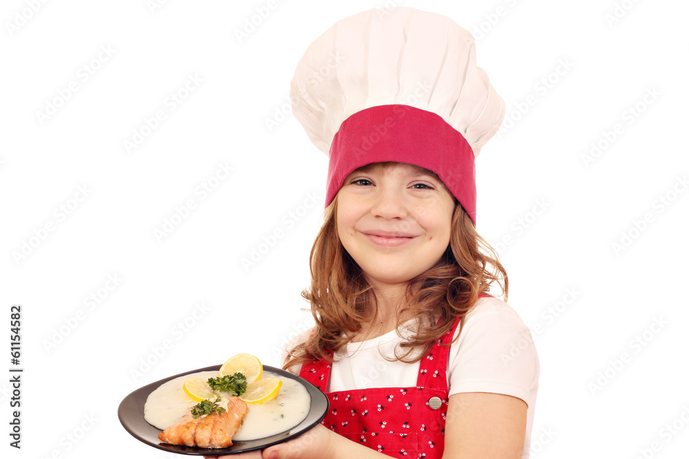 happy little girl cook hold dish with salmon seafood happy little girl cook hold dish with salmon seafood