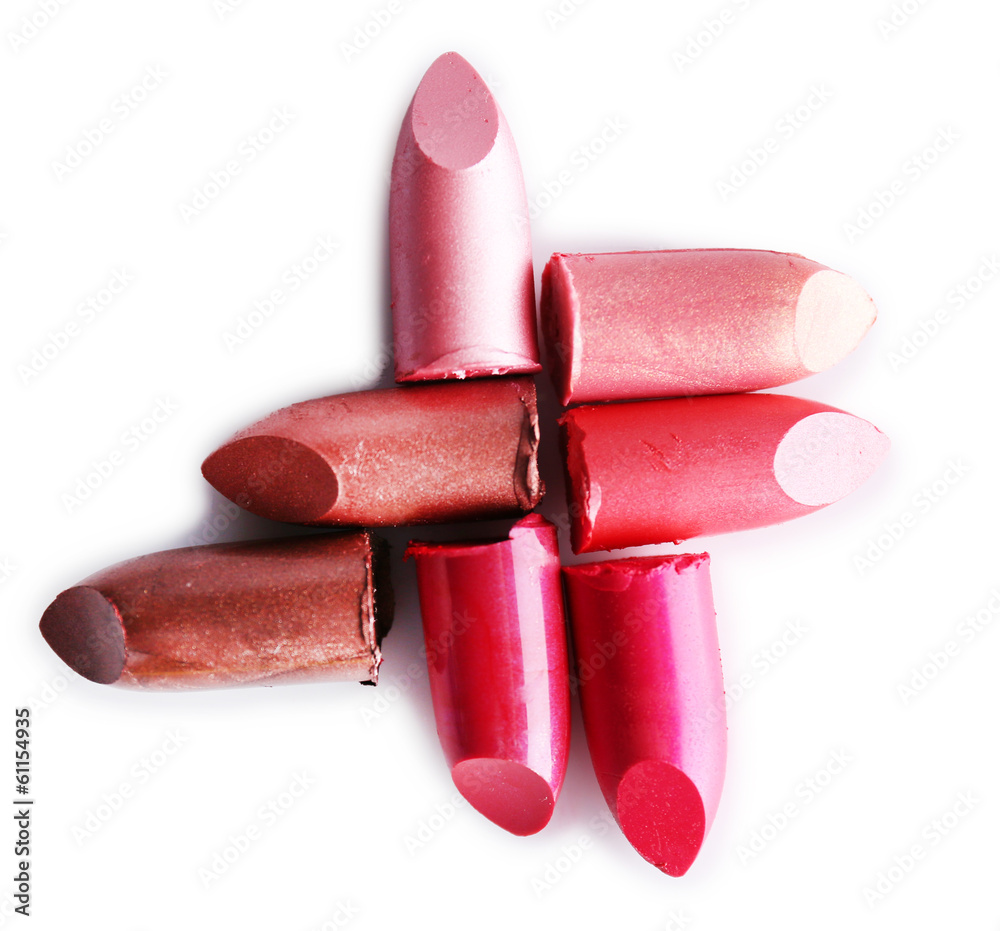 Several different lipsticks isolated on white Several different lipsticks isolated on white