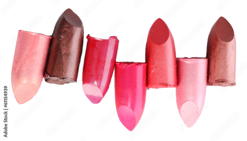 Several different lipsticks isolated on white Several different lipsticks isolated on white