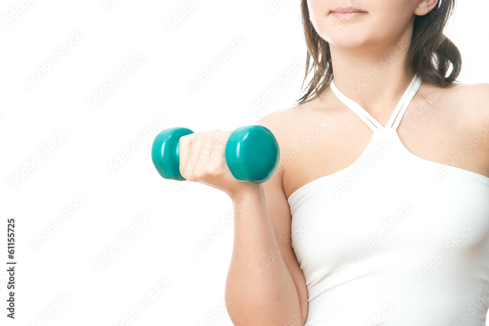 Girl with green dumbbells in hand Girl with green dumbbells in hand