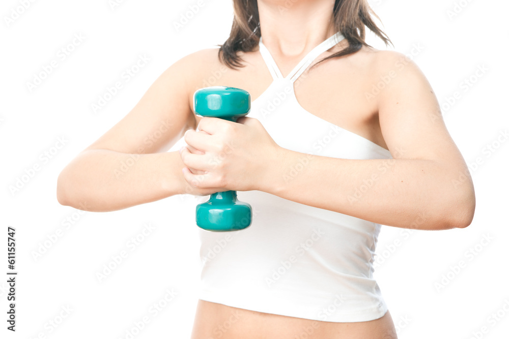 Girl with green dumbbells in hand Girl with green dumbbells in hand