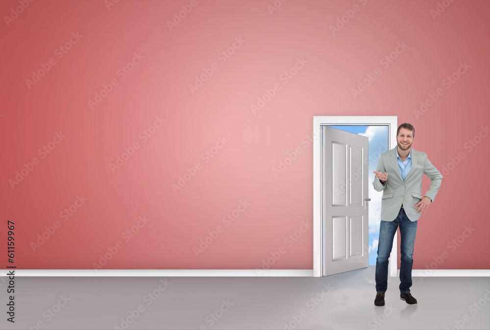 Composite image of stylish man smiling and gesturing Composite image of stylish man smiling and gesturing
