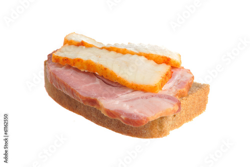 A ham sandwich with lard isolated on white