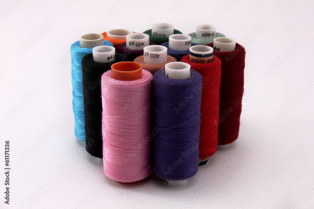 катушки ниток на белом фоне Stock Photo | Adobe Stock