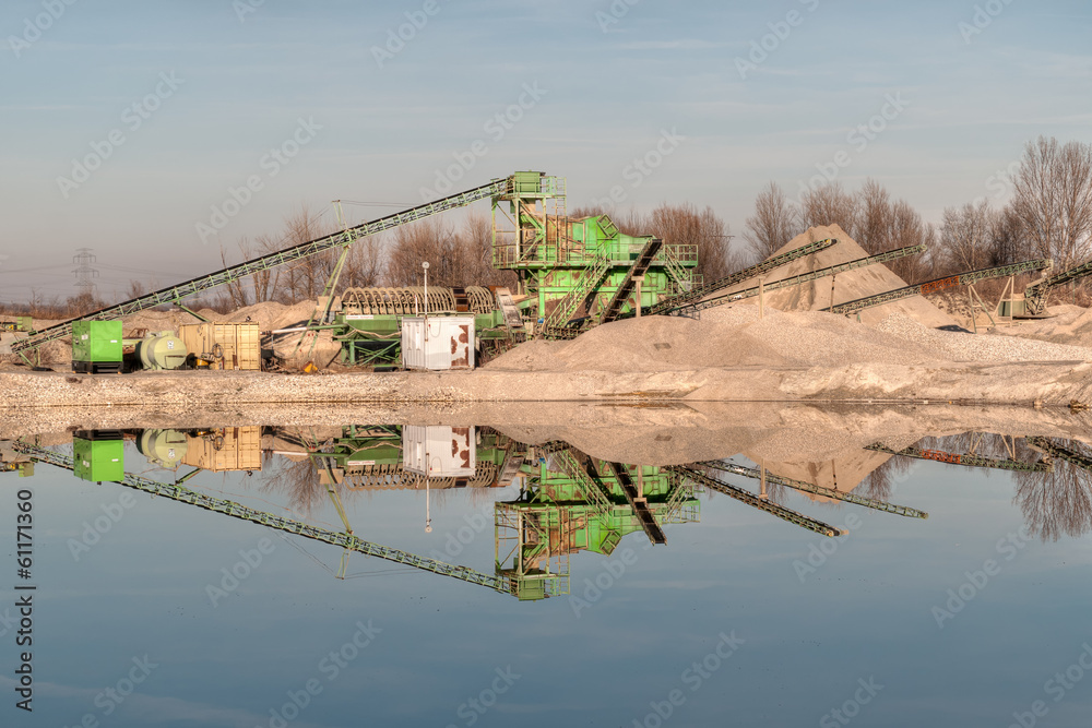 Kiesgrube mit Maschinen und einem Teich Stock Photo Adobe Stock