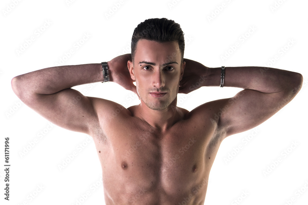 Handsome, fit young man shirtless, with hands behind his head Handsome, fit young man shirtless, with hands behind his head