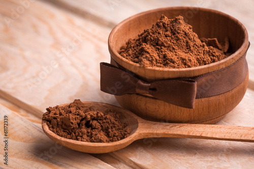 flavored cocoa powder in wooden bowl