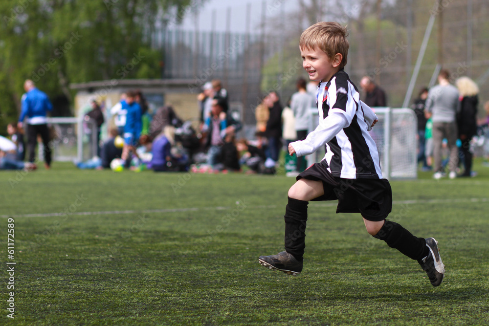 Boy playing soccer