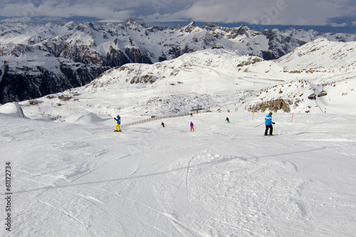 Skiers on ski slope