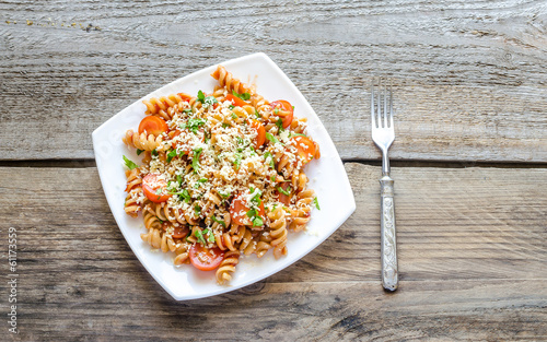 Whole heat fusilli pasta with cheese and cherry tomatoes