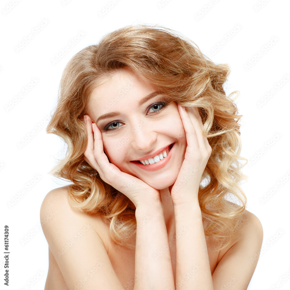 Beautiful young model smiling on a white background. Beautiful young model smiling on a white background.