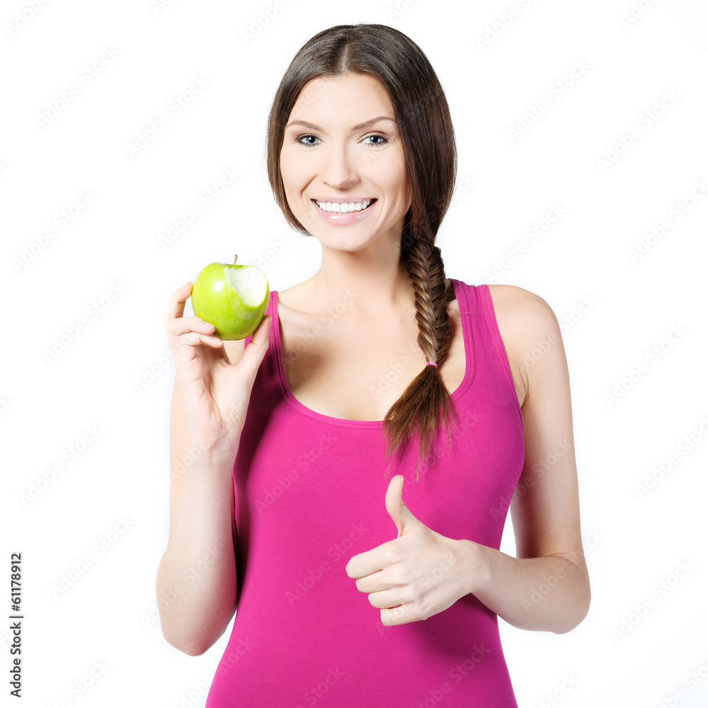 Smiling woman with green apple on a white background Smiling woman with green apple on a white background