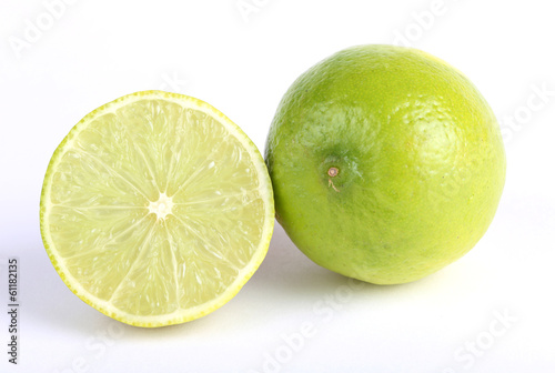 Fresh limes on white background