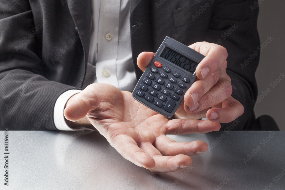 male financial manager's hands with figures male financial manager's hands with figures