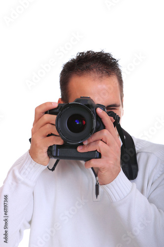 Young photographer with camera, isolated