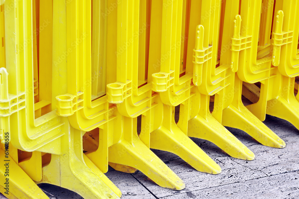Fototapeta premium plastic yellow barrier in a row