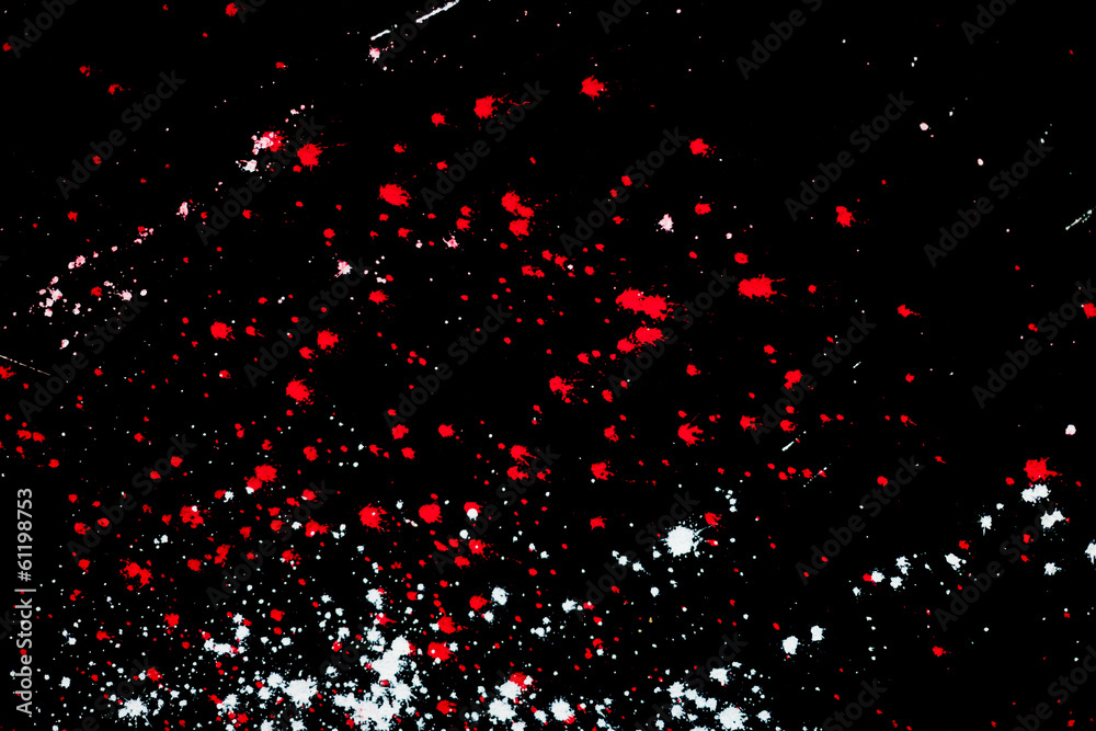Bright ink splat design with a black background Bright ink splat design with a black background