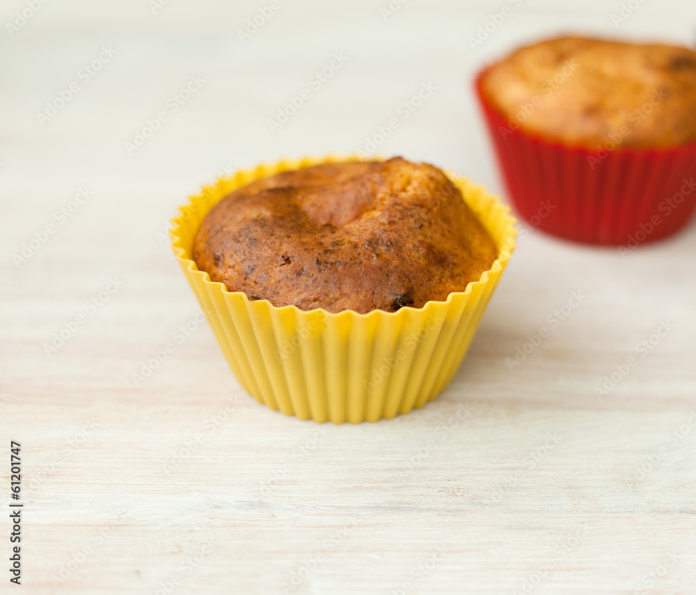 homemade cupcakes on a wooden table homemade cupcakes on a wooden table