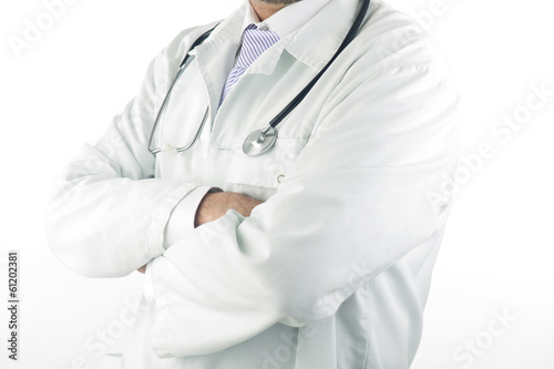 Close-up of a doctor holding a stethoscope with his arms crossed