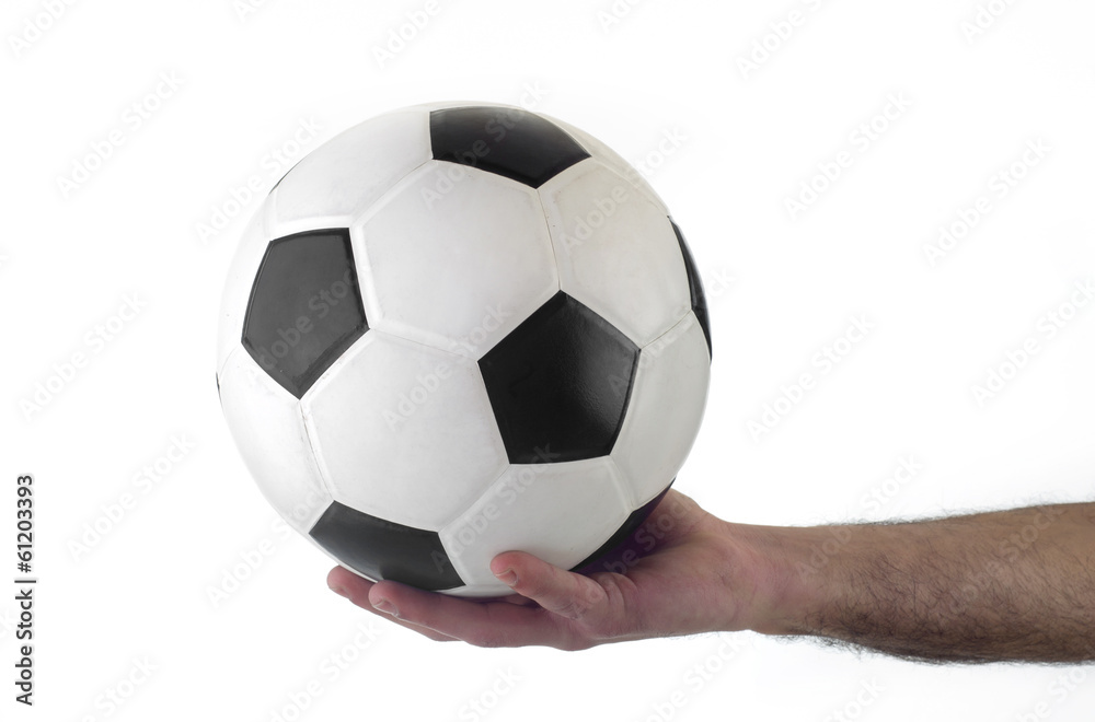 Hand holding soccer ball up isolated on white Hand holding soccer ball up isolated on white