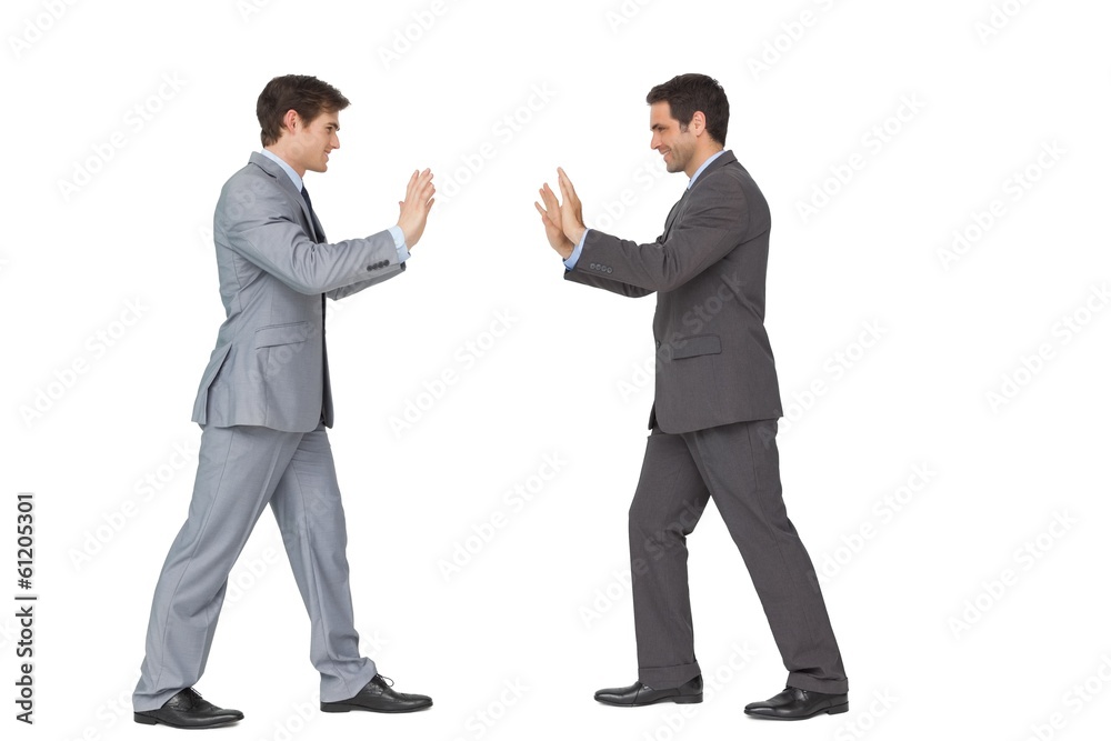 Business partners pushing copy space Business partners pushing copy space