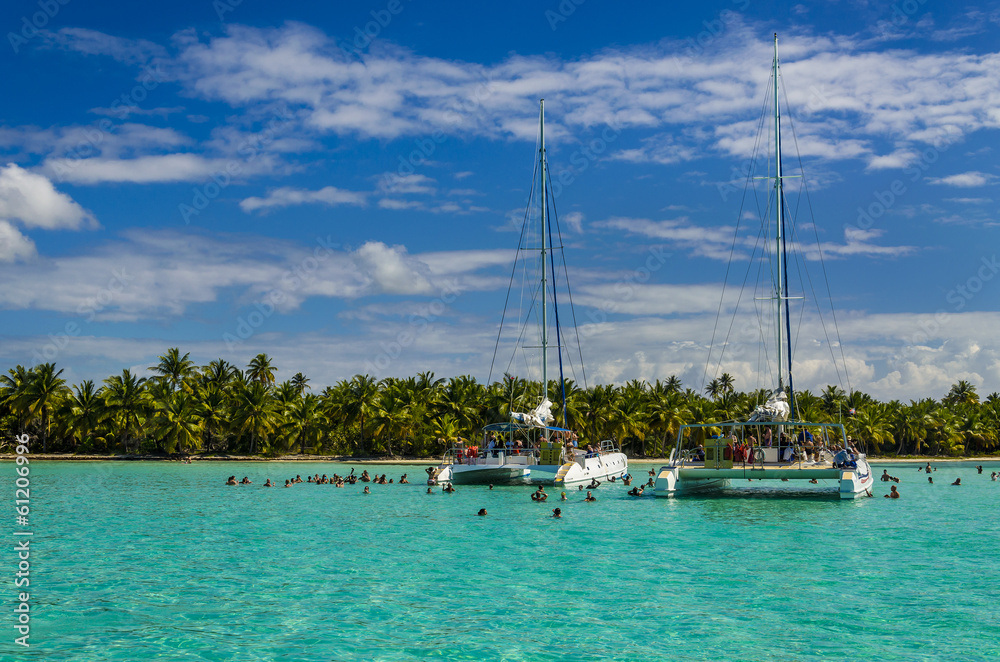 Catamarans on azure water, Caribbean holidays Sanoa Dominicana Catamarans on azure water, Caribbean holidays Sanoa Dominicana