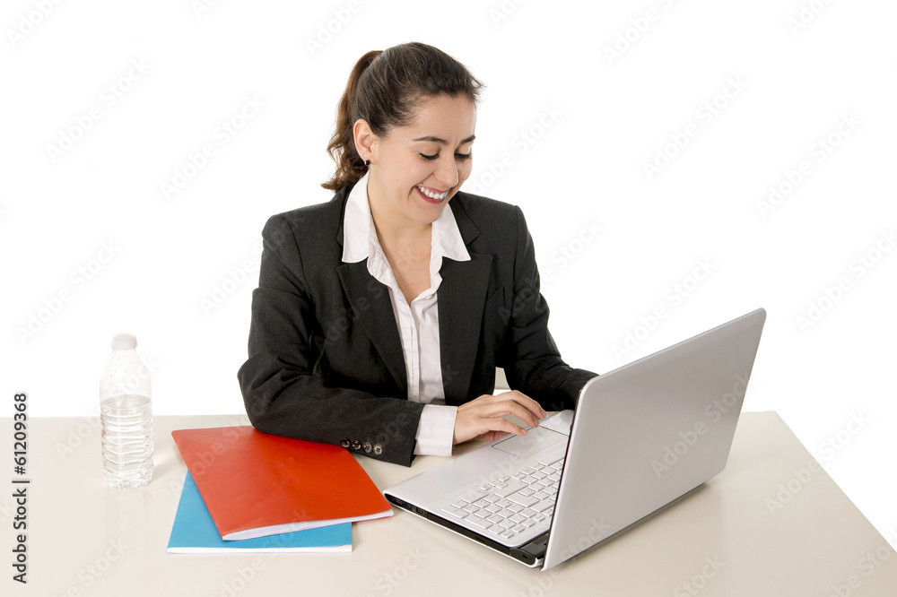 happy business woman smiling working on her laptop happy business woman smiling working on her laptop