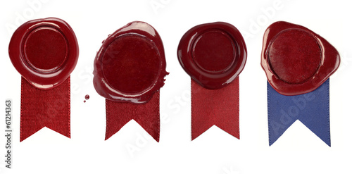 Set of wax seals with ribbons on white background