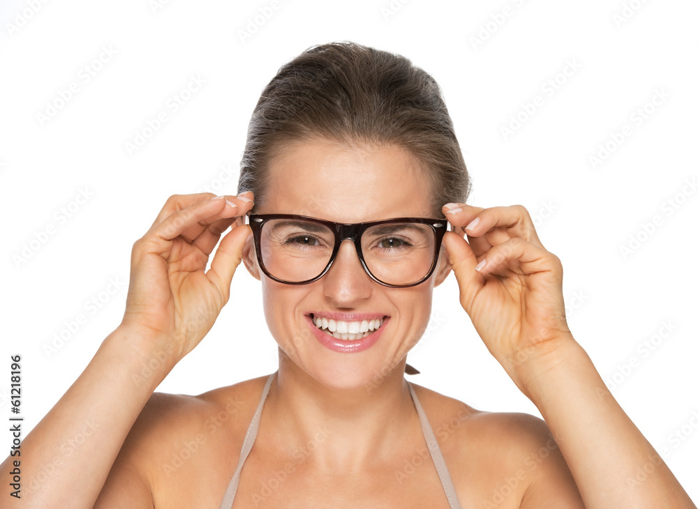 Portrait of smiling young woman in eyeglasses Portrait of smiling young woman in eyeglasses
