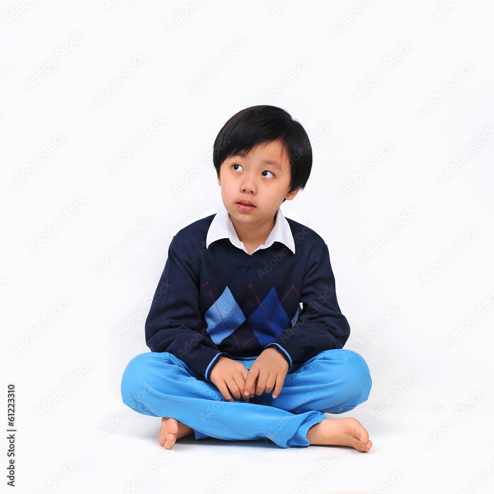 Cute Asian boy model posing in casual wear Cute Asian boy model posing in casual wear