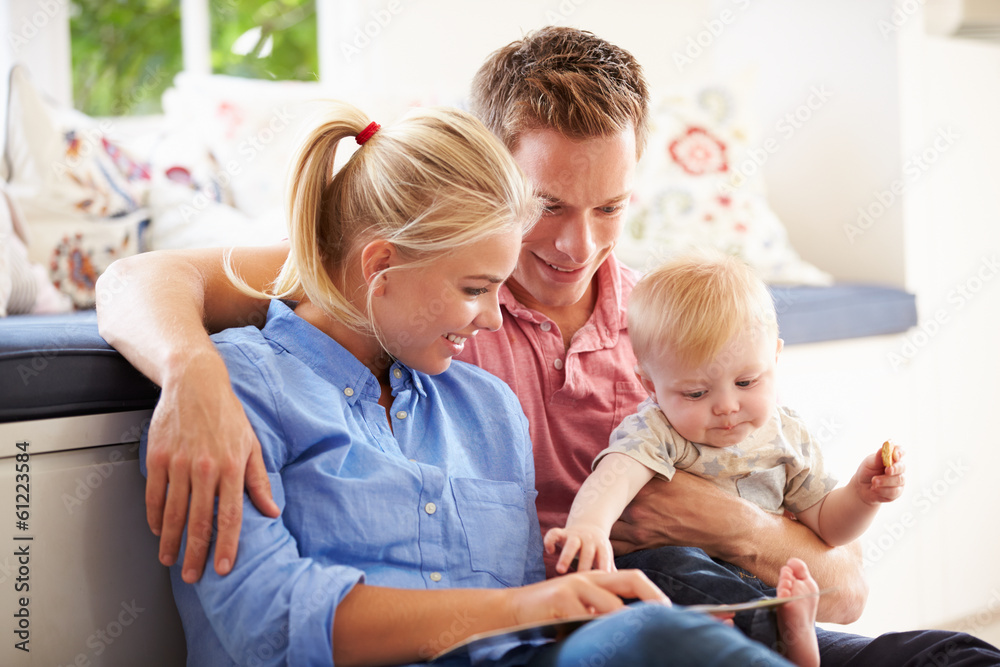 Parents Reading Book To Young Son Parents Reading Book To Young Son