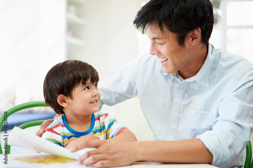 Father Helping Son With Homework Father Helping Son With Homework